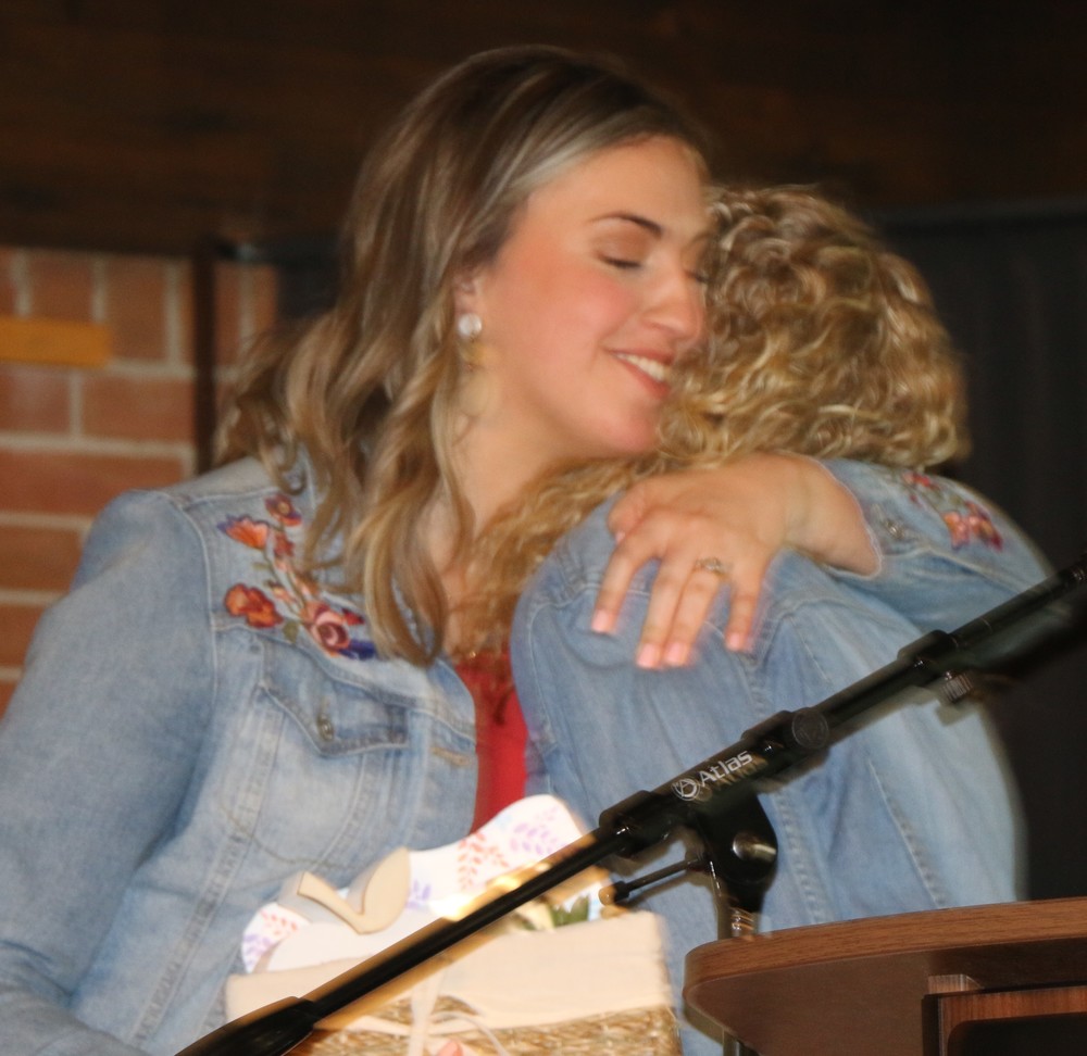 Alyssa Julian thanks Macy Cagle for her Most Influential Educator gift