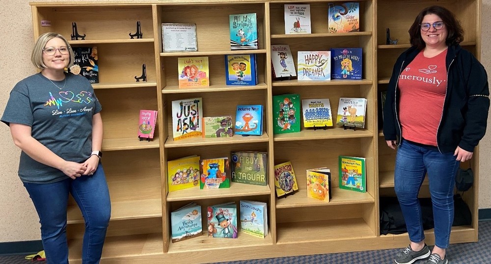 Mrs. Shalee Myron and Ms. Tiffany Ickes-Pauley display the Northside Inclusive Library