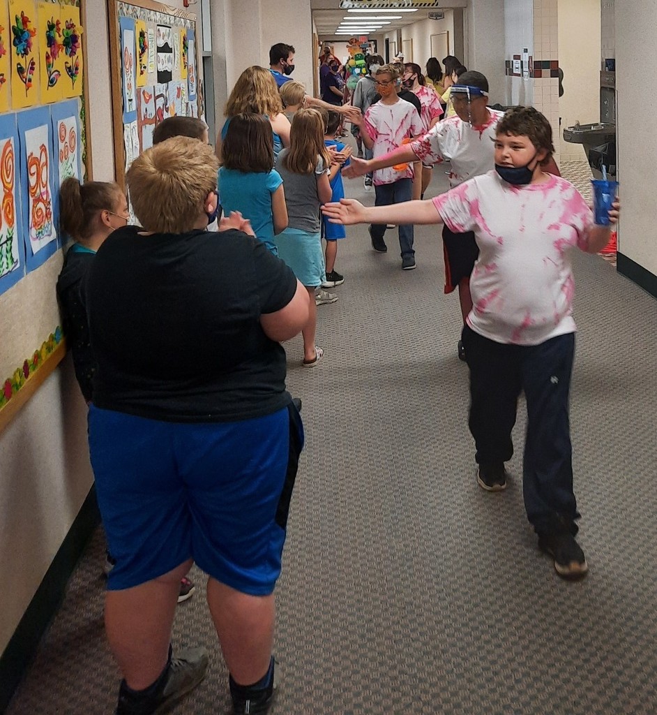 6th graders parade down halls at MES