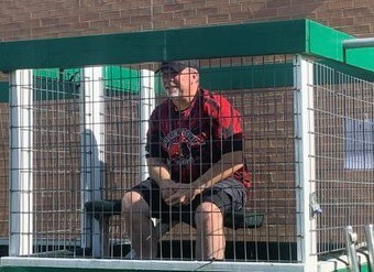 Principal Biddle sits in the dunk tank