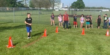 Students play games outside during field day