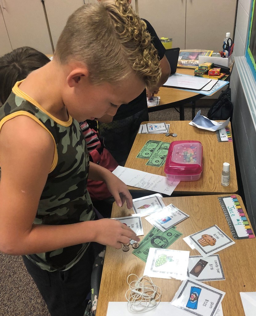 4th grade boy calculates his budget