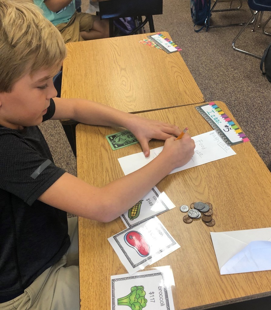 Student adds up his money