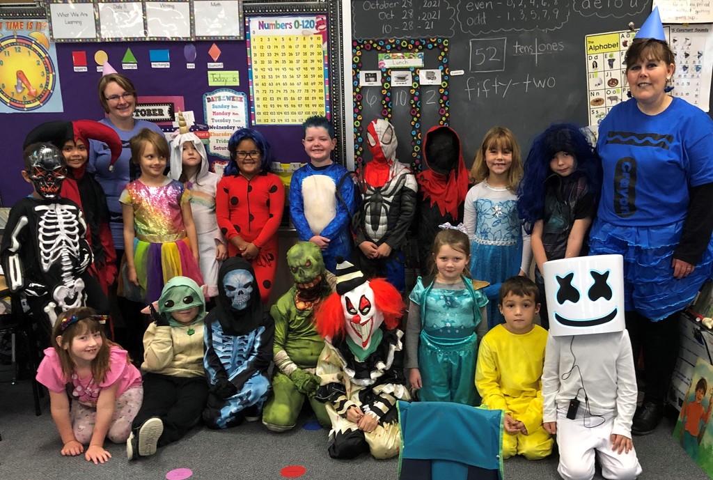 Mrs. Fisher's first grade class decked out for Halloween