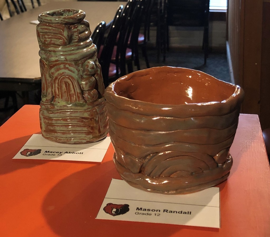 2 pieces of pottery on display at DeJa Brew