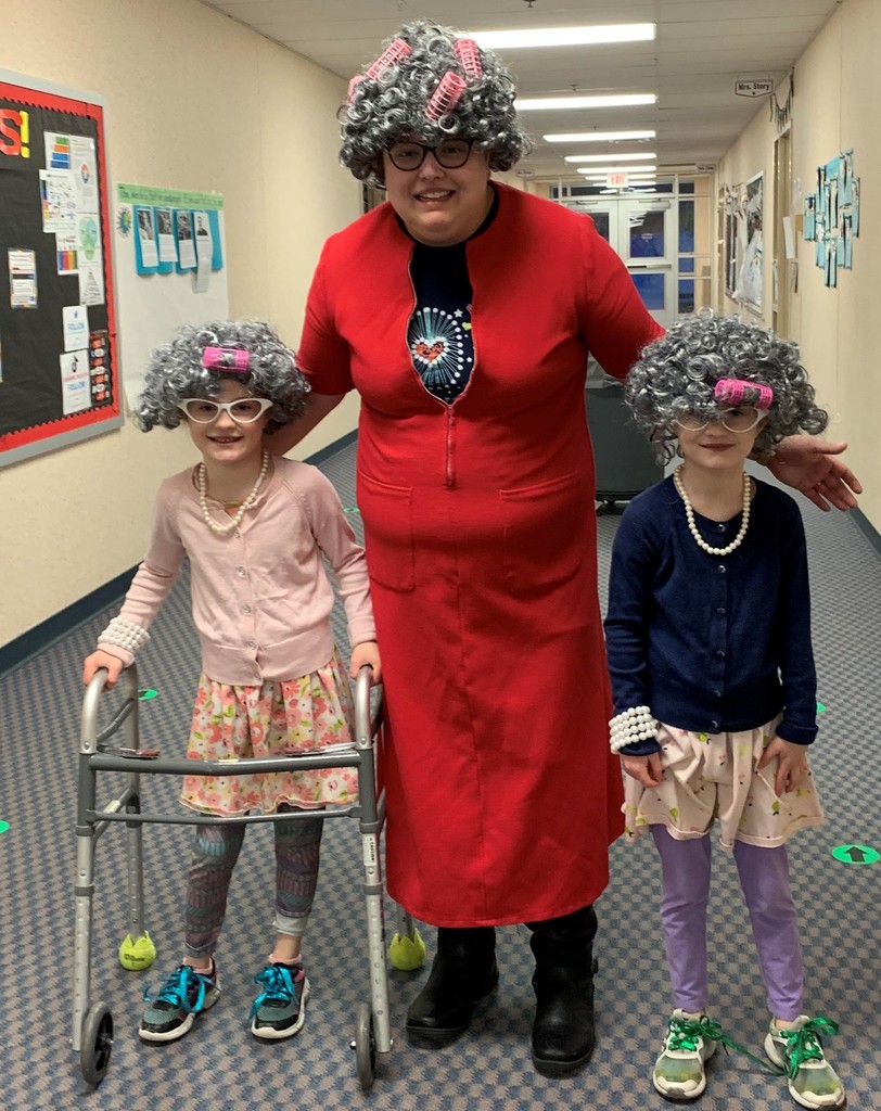 Mrs. Julia Duncan and two of her students celebrate first 100 days of school