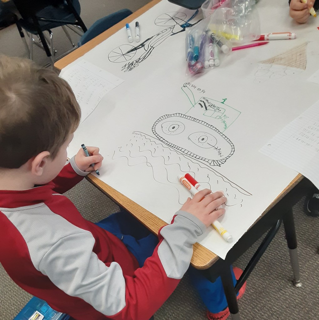 Boy drawing oval 
