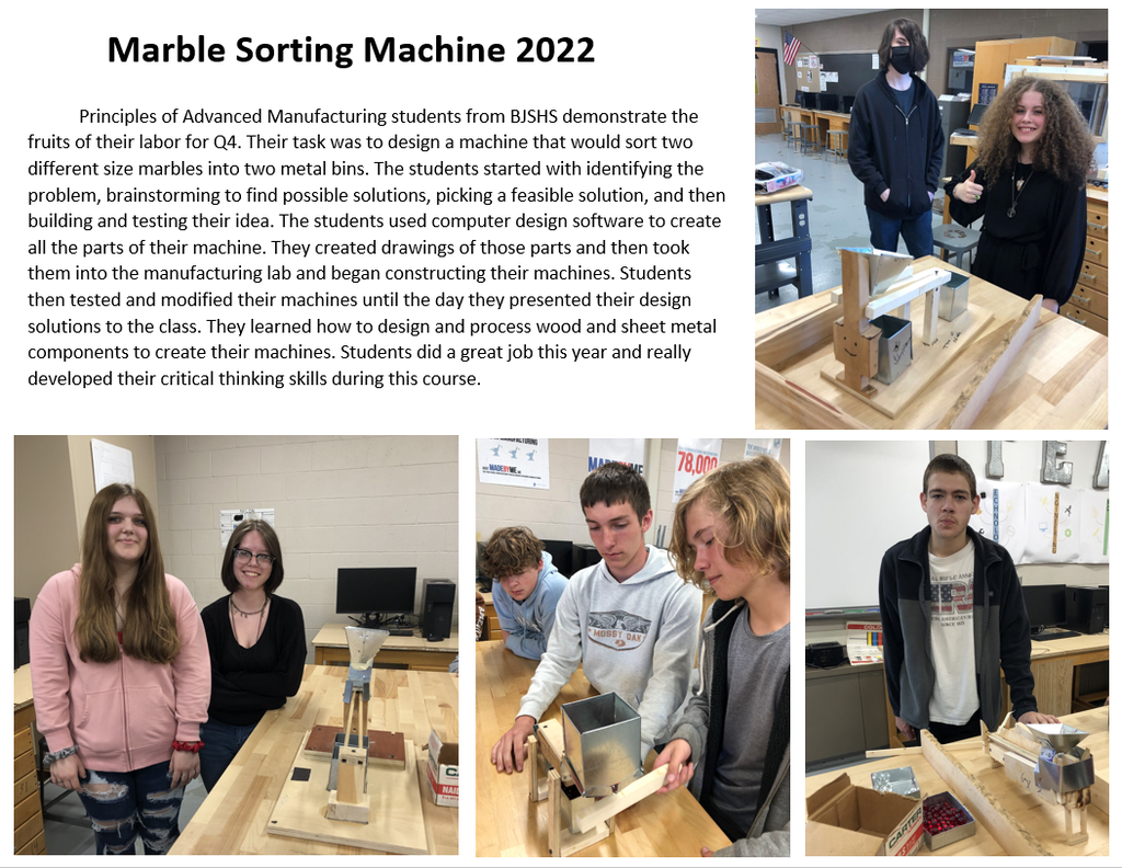 Students demonstrating marble sorting machine in advanced manufacturing