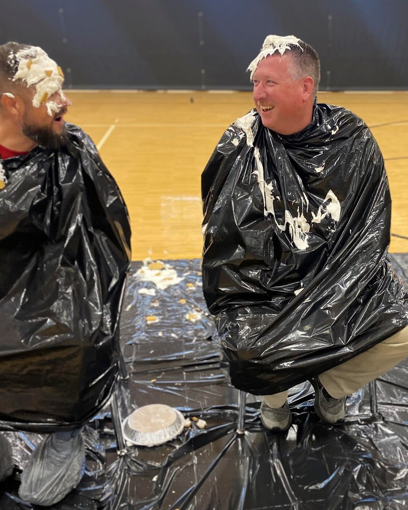 Staff members receive a pie in the face during Block Party