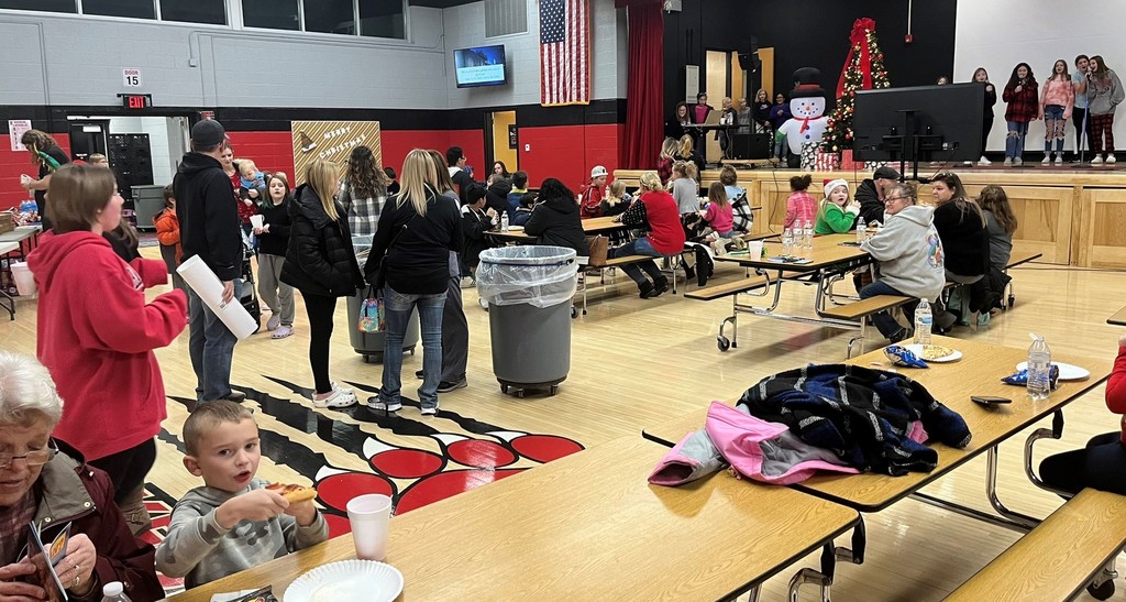 Students  and their families enjoy snacks during Jollyfest