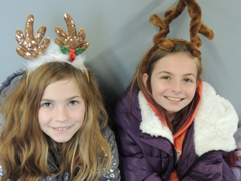 Two BIS girls wear antlers