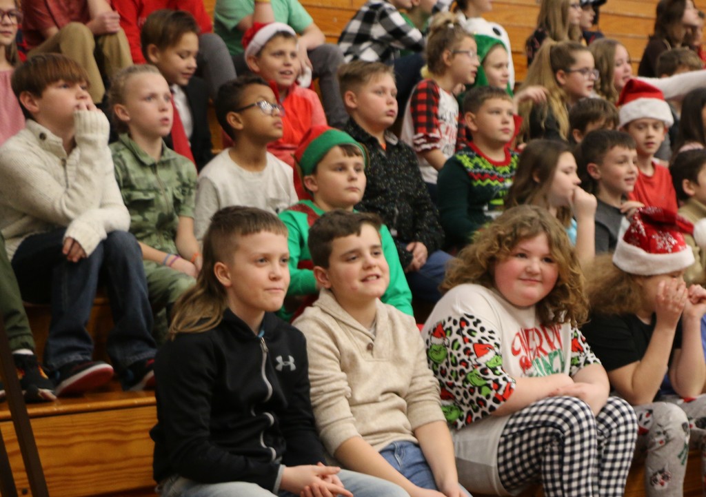 Students prepare to perform during Christmas program