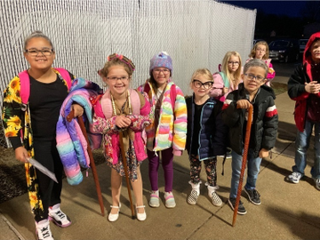 Boys and girls dress up as old timers to celebrate 100 Days of School