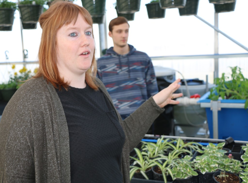Shelbi Blankenbaker and Nathan Elliot explain some of the features of the new greenhouse