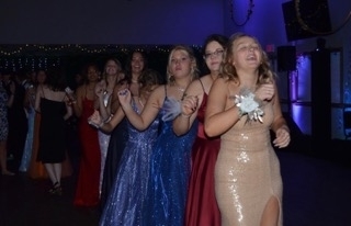 girls dancing at prom