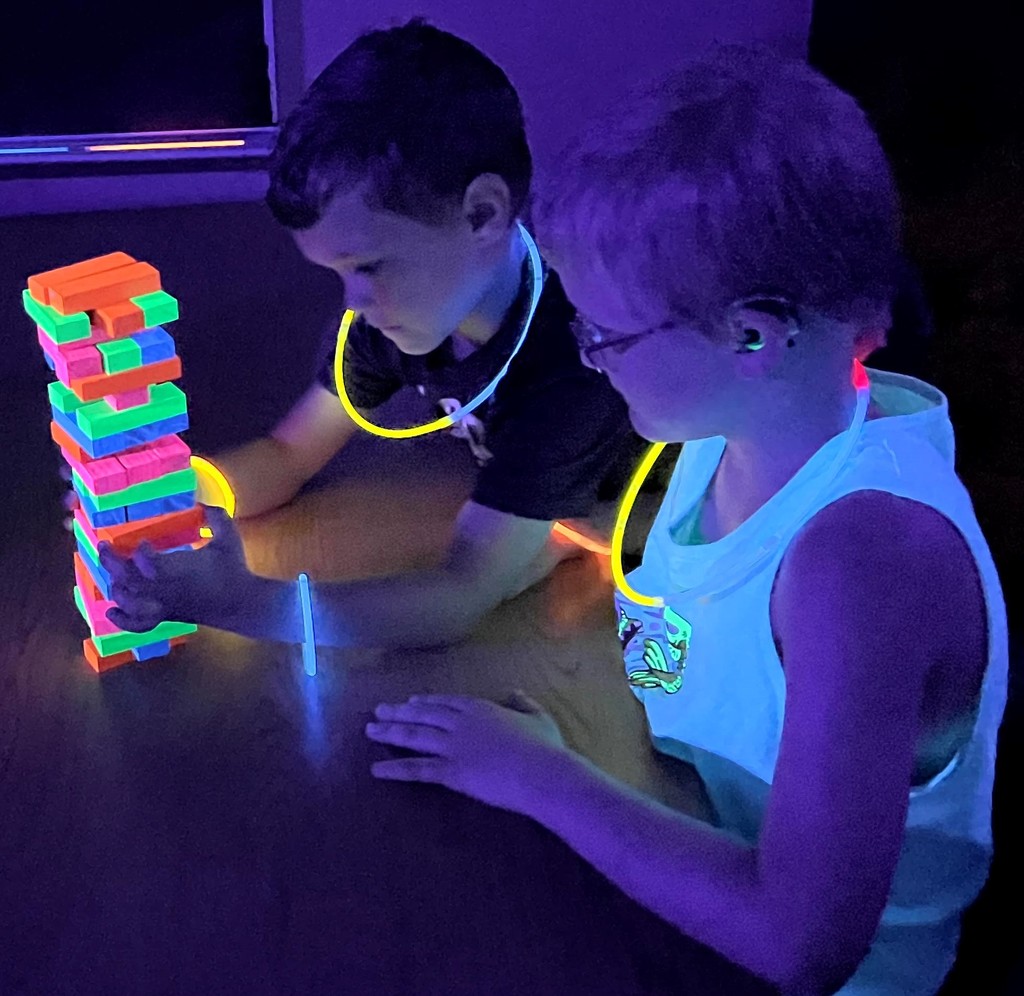 Two first graders participate in Glow Day