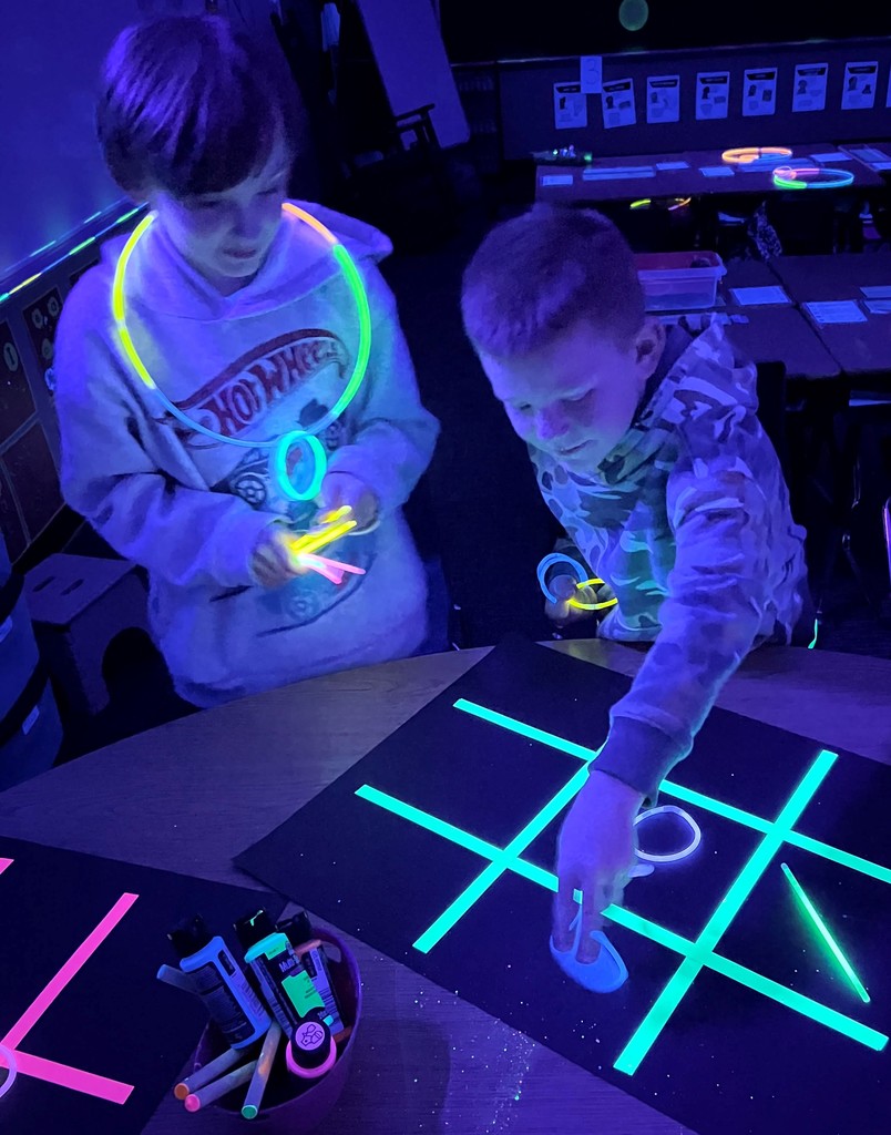 Students play glow-in-the-dark 