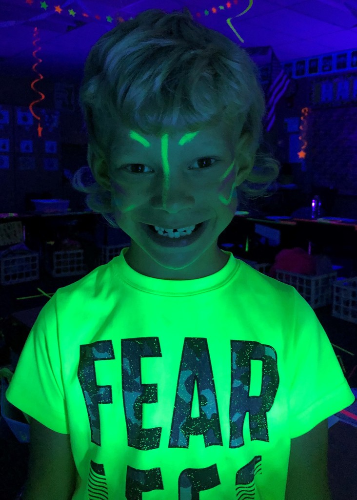 1st grader enjoys glow party