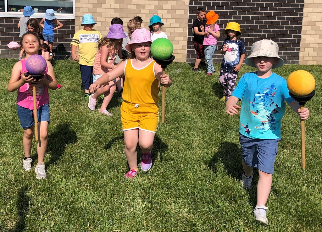 First grade students race during Field Day